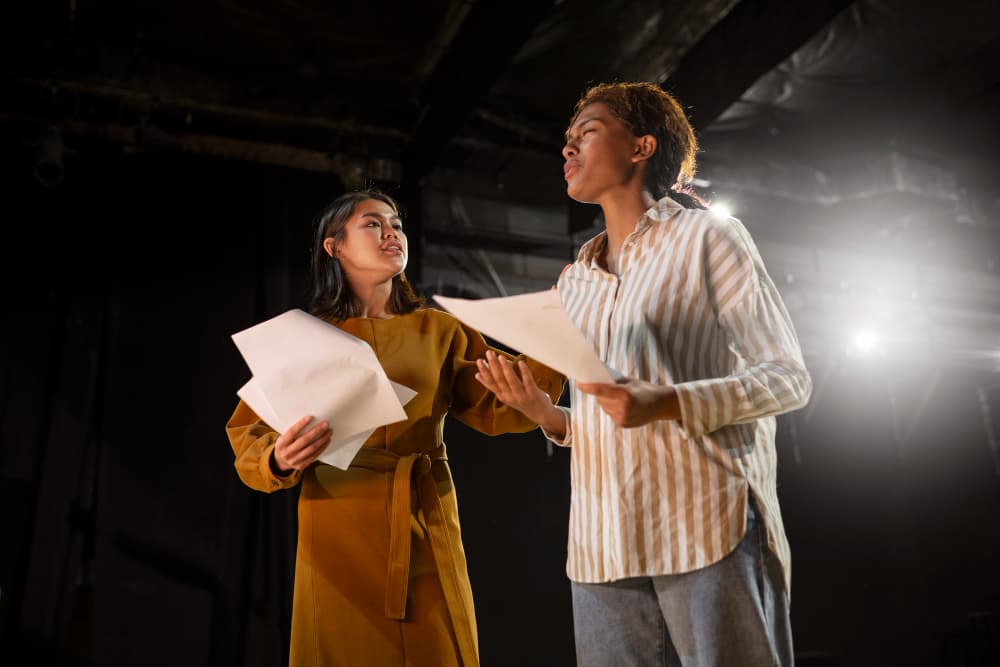 Performers rehearsing at Thornton Little Theatre